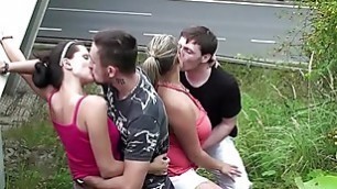 Cum on a chubby girl with big tits in extreme public foursome sex by a highway