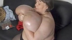 Karola oiling her huge tits